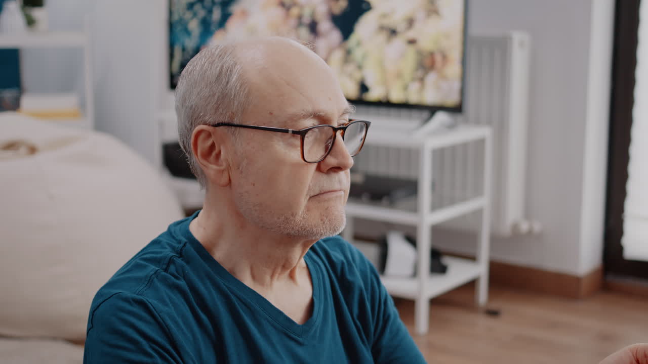 Close up of retired person relaxing with meditation activity