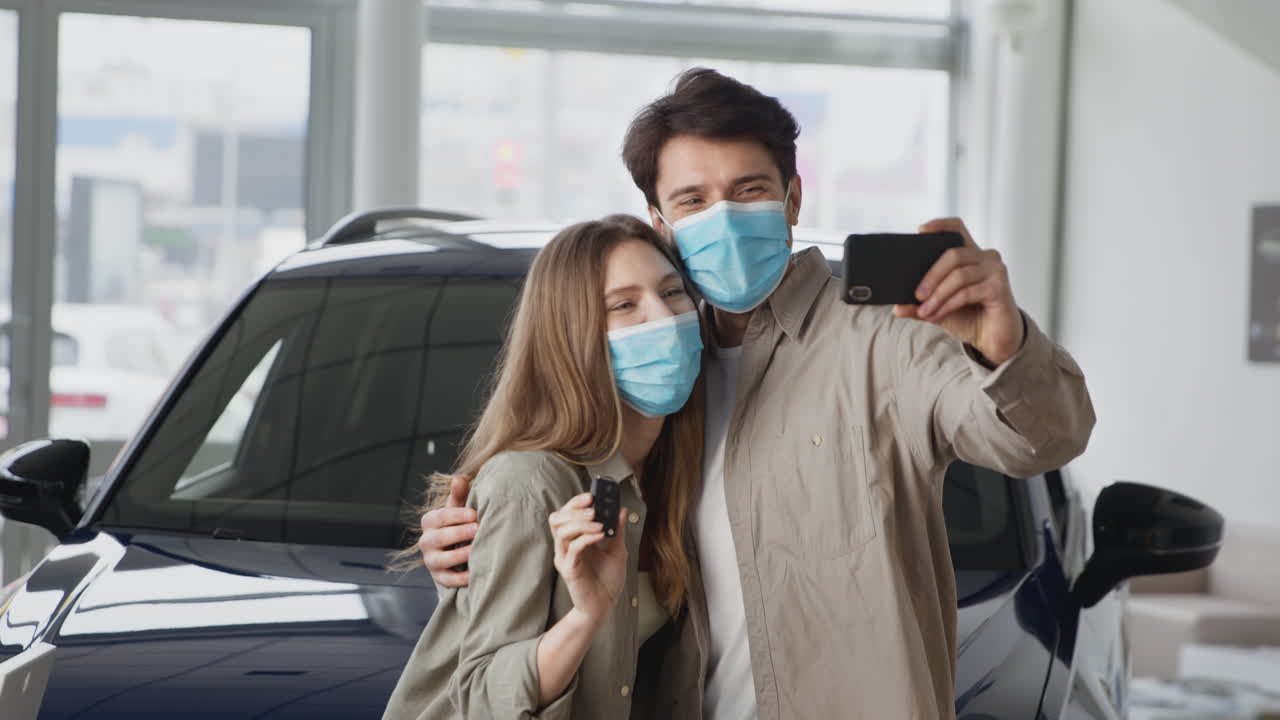 Couple Celebrating New Car Purchase During Pandemic