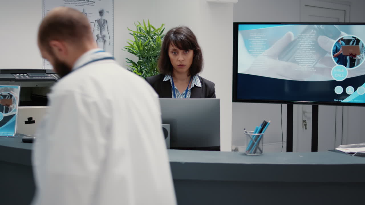 Hospital reception area with receptionist