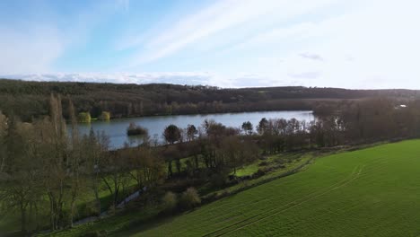 Dampierre-sur-Avre-pond-and-surrounding-rural-landscape,-France