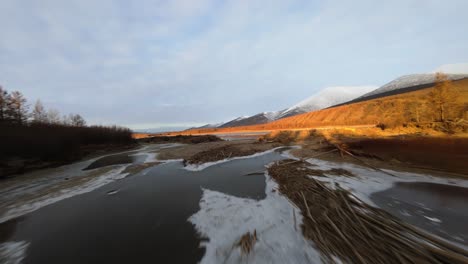 beautiful winter sunset over alaskan river