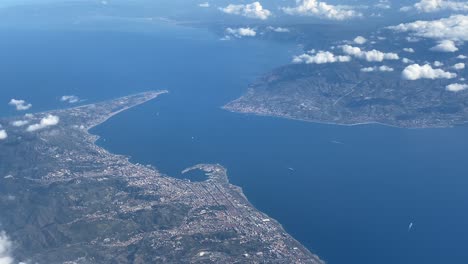 aircraft plane window view, sicily separated from italy by messina strait