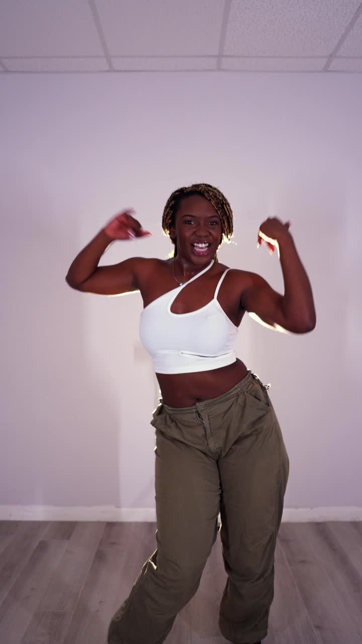 Woman dancing in studio