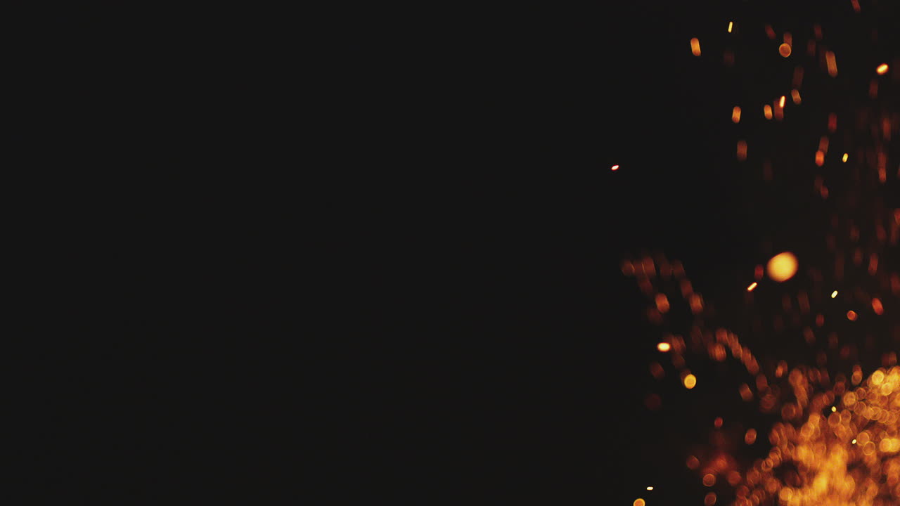 Abstract fire sparks in the darkness