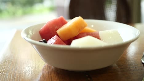 close up of slice of water melon and papaya in a bowl for breakfast