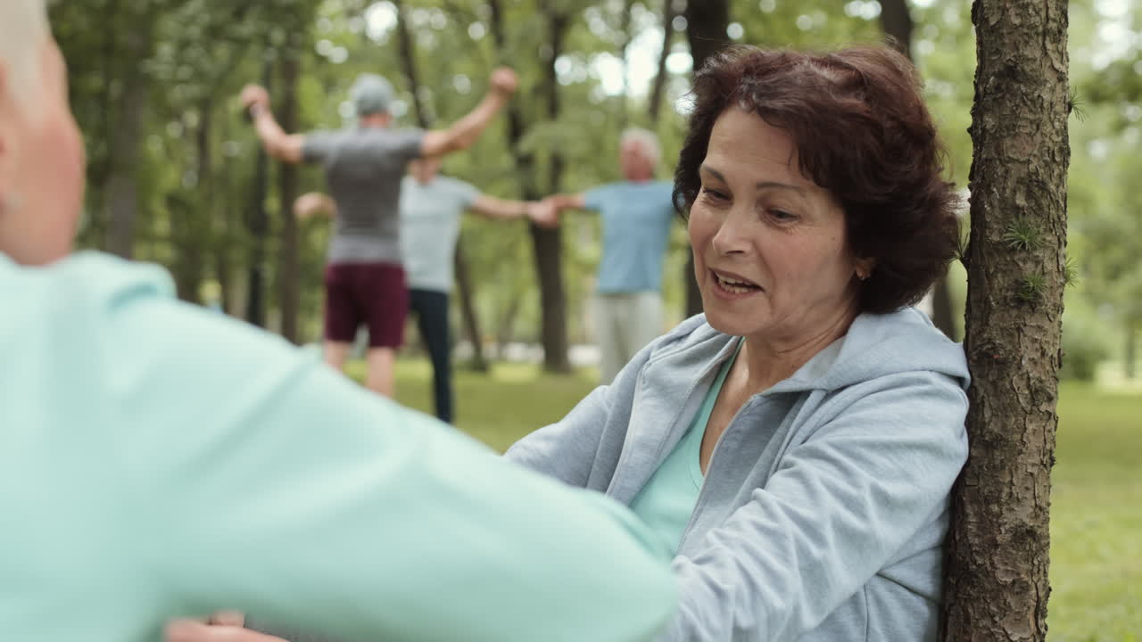 Senior women talking in a park