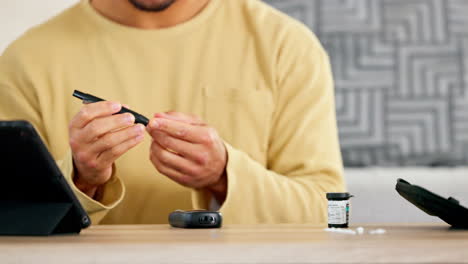 a young man with diabetes testing his blood sugar