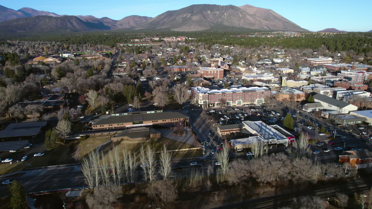 Drone Shot of Flagstaff, Arizona USA, City Hall, Downtown Street Traffic and Buildings
