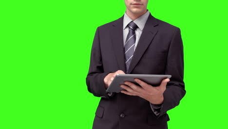 businessman using his digital tablet