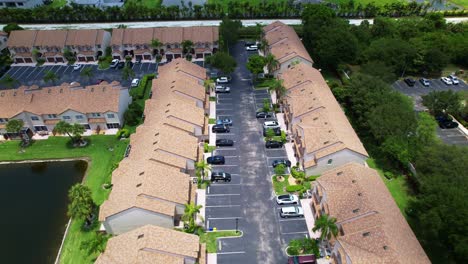 straight aerial of tree lined streets and rooftops in west palm beach residential area