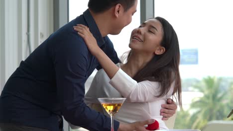 happy romantic couple eating lunch at restaurant