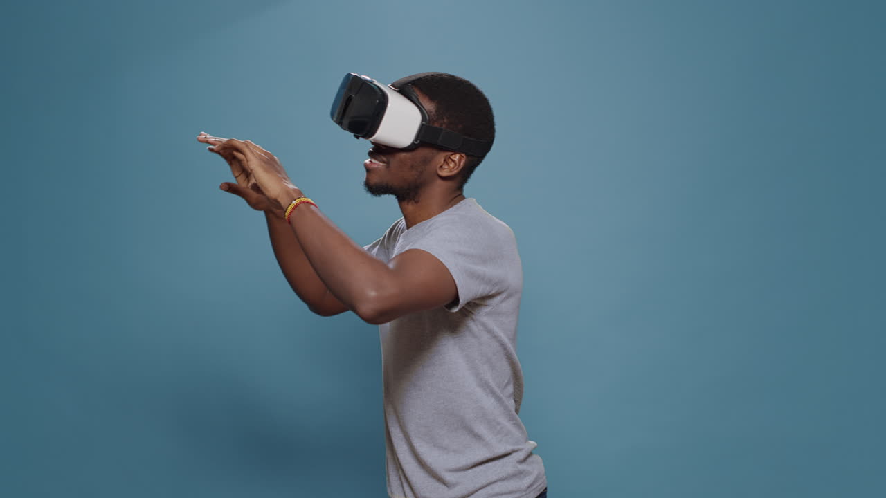 Modern man using vr glasses with futuristic augumented software