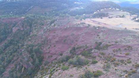 fly over the trees and the mountains of the cantó hills