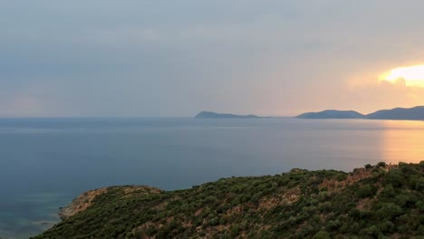 sardaignan sunset on shore and sea view from a drone