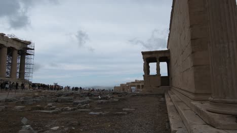 the parthenon on the top of the athenian acropolis, people enjoy sightseeing on 10-14-2021, greece, athens