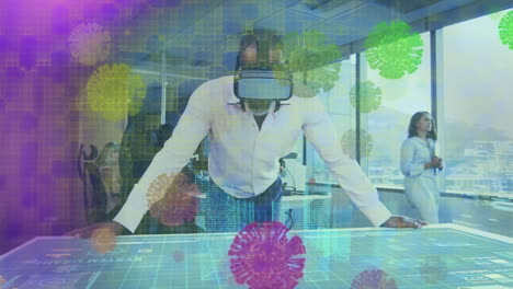 Animation of covid virus cells over man in vr headset working in office