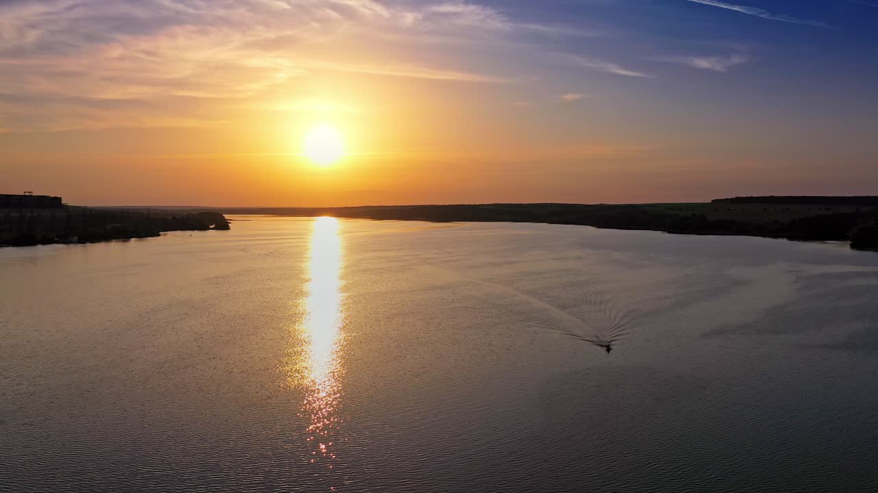 Aerial sunset view of river. Sunset over the river in the countryside