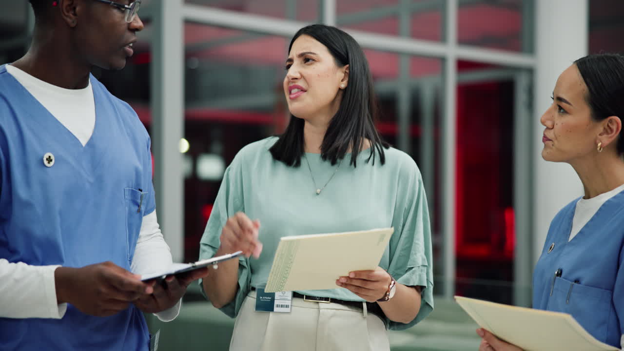 Medical professionals discussing patient care in a hospital
