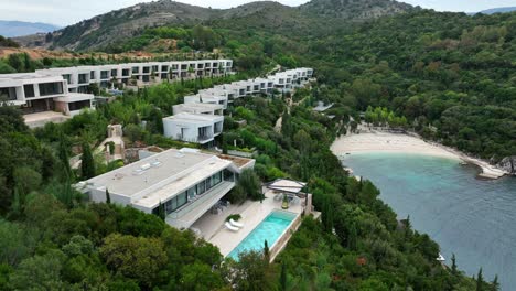 resort coastline in saranda, albania with hotels and pool beside turquoise ionian sea