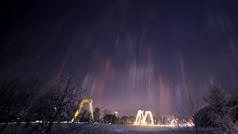 Lightpillars-over-Järvenpää,-Finland-in-winter-at-night