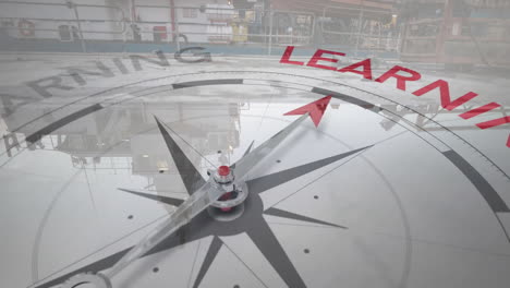 animation of compass with learning text over shipyard