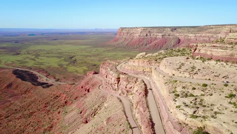 cars travel on the dangerous mountain road of moki dugway new mexico desert southwest