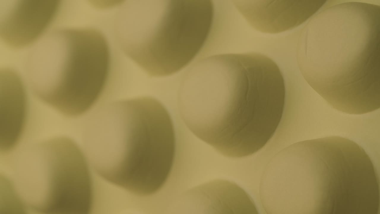 superficie de goma verde del masajeador