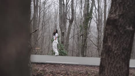 lost soul in white wandering around at montseny forest spain