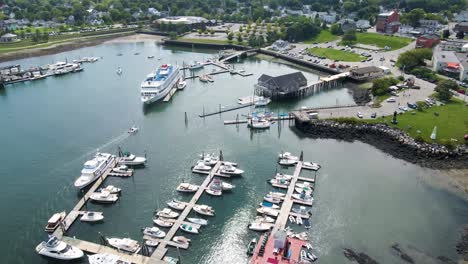 boats docked at rockland harbor in maine | aerial mid-day flyover | summer 2021