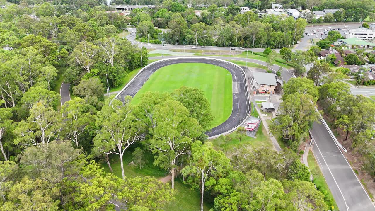 Aerial footage of track surrounded by greenery