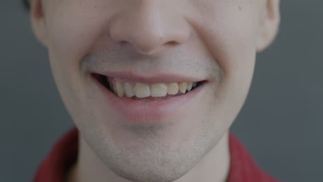 smiling man's face close up