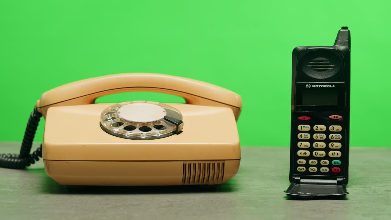 Retro vintage phone, A yellow rotary telephone is displayed on a wooden desk, adding a nostalgic touch