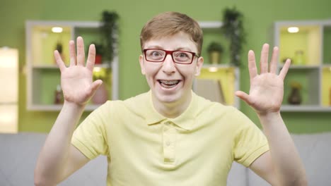 close-up portrait of funny and cheerful young man.