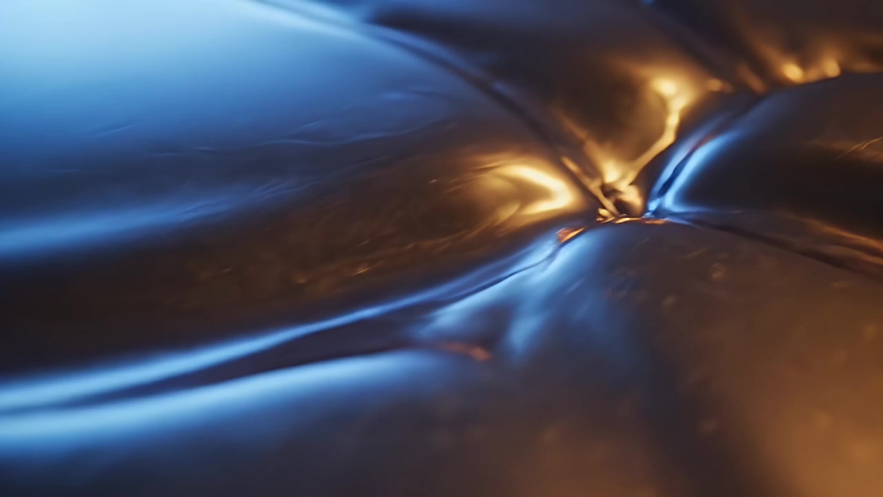 Abstract Surface of Liquid Metal with Blue and Gold Lighting