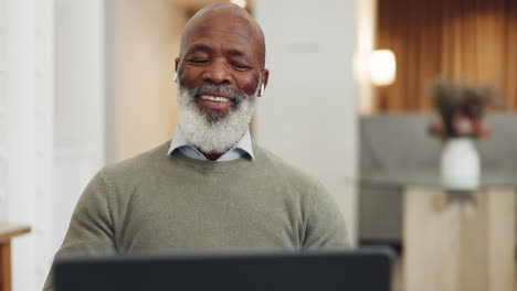 Earphones,-laptop-and-black-man-on-video-call