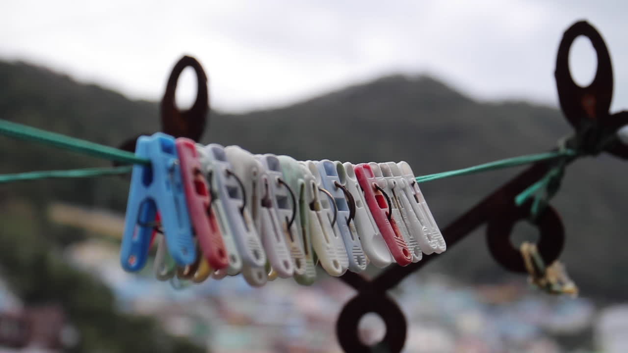 Clothes Pegs on a Clothesline
