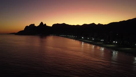 people chilling by the sunset