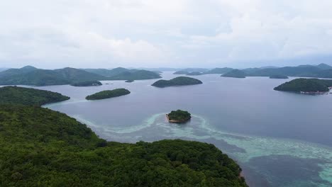 aerial seascape view of remote tropical islands and coral reef ecosystem in remote coron bay, palawan, philippines