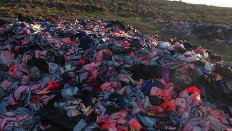 piles of refugee lifejackets on lesvos island