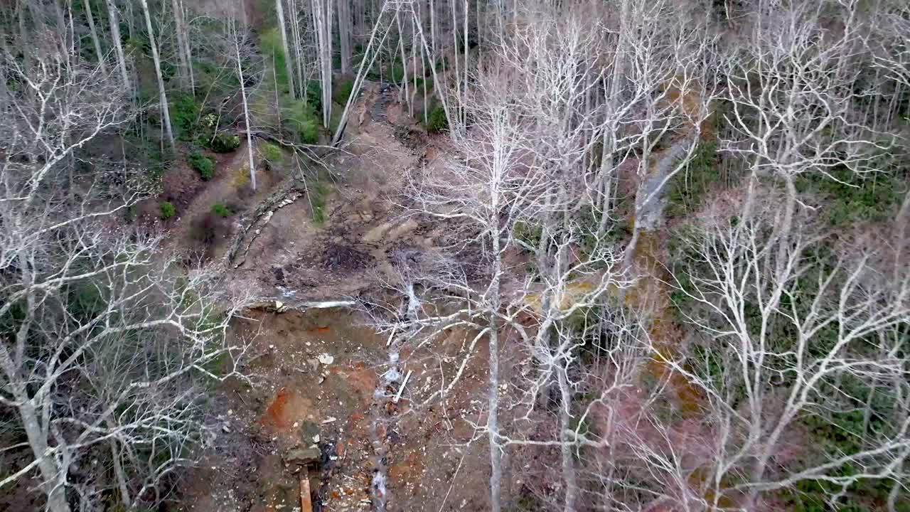 dam break aerial from pond near boone nc during hurricane helene