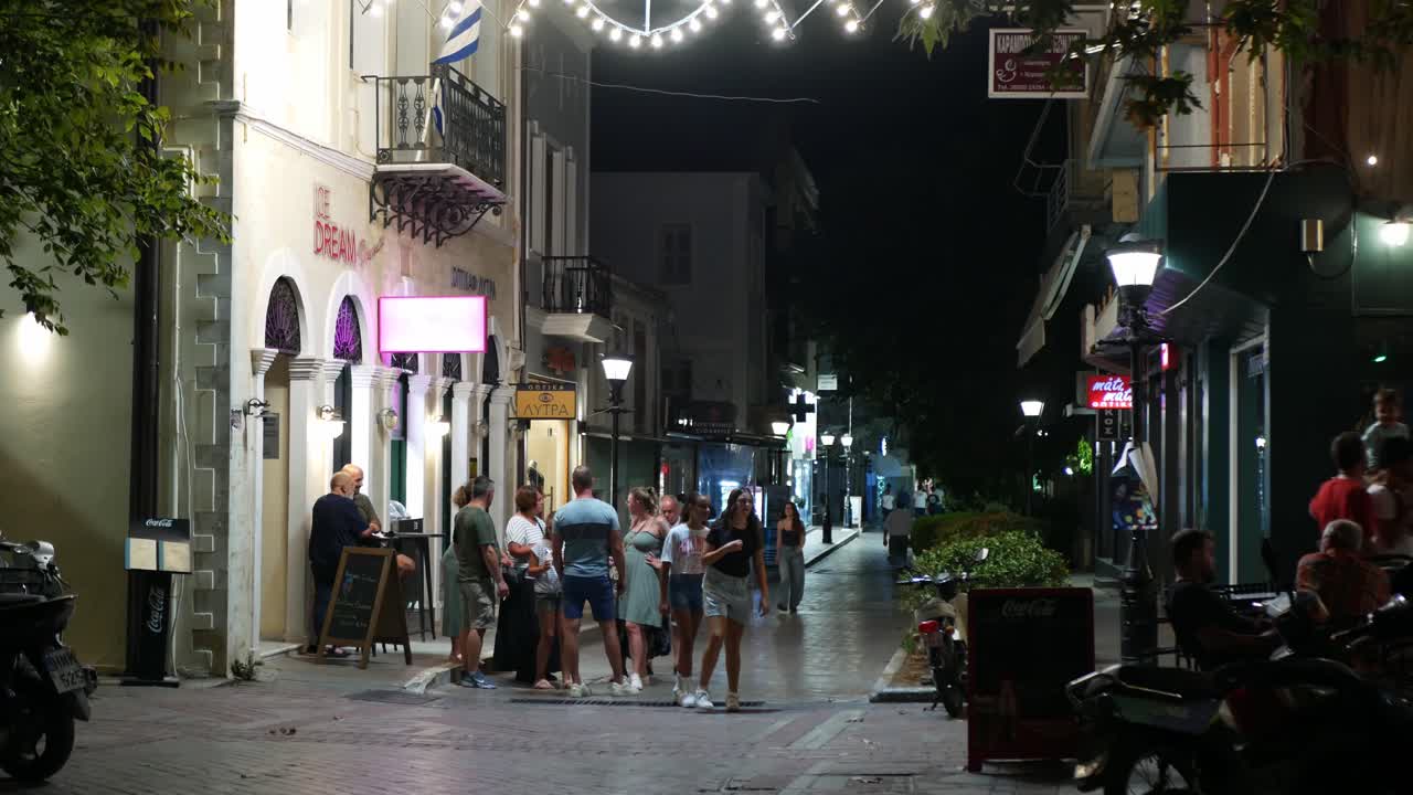 Tourists and locals enjoying a warm night