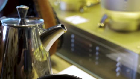 delicious hot coffee being poured into a mug