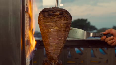 sirloin trompo de carne for tacos taco flame fire grilled grill hot spinning raw authentic healthy mexican latin cantina restaurant party fiesta