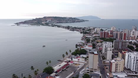 Aerial-view-of-part-of-the-city-of-Lecheria-with-El-Morro-hill,-located-in-northern-Anzoátegui-State,-Venezuela