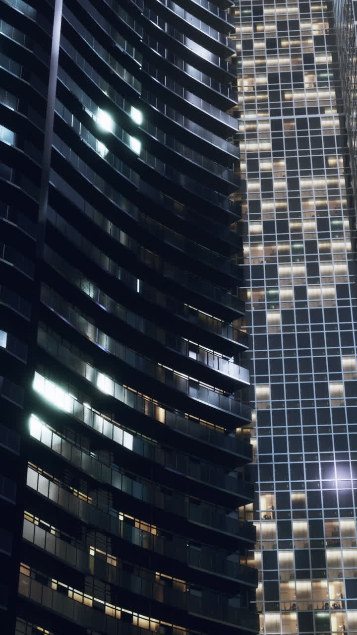 un alto edificio rascacielos por la noche