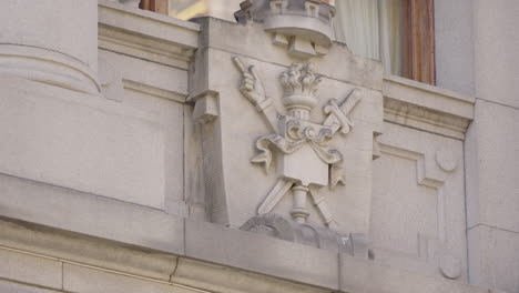 carved detail on the facade of the supreme court of norway