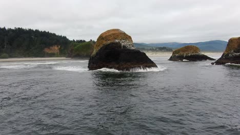 oregon coast rock reveal shot, cannon beach