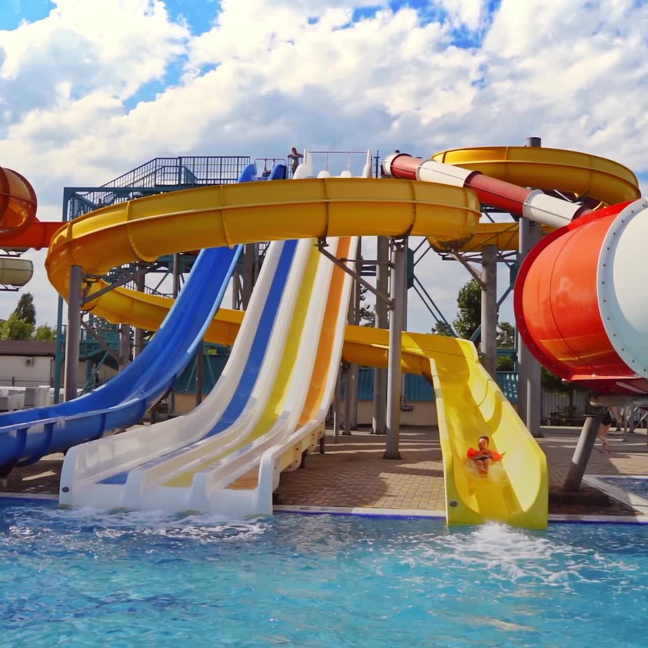 Waterslides with blue pool