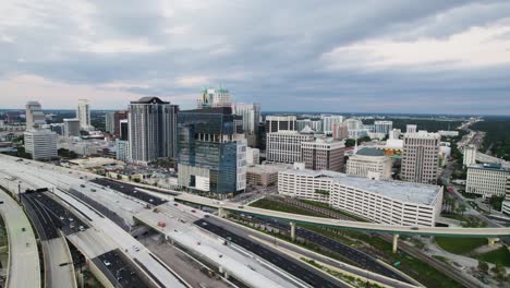 cinematic aerial footage of downtown orlando and the i-4 from the south west