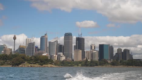 wide shot of the sydney cbd skyline from the harbor on a boat